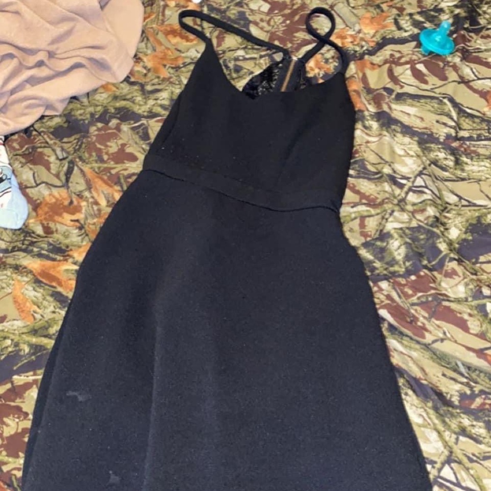 The black dress is a size XL,navy blue dress is a size L